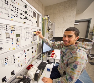 Student working on the smart grid